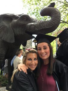 Mauri Artz with one of her many successful graduates on graduation day.
